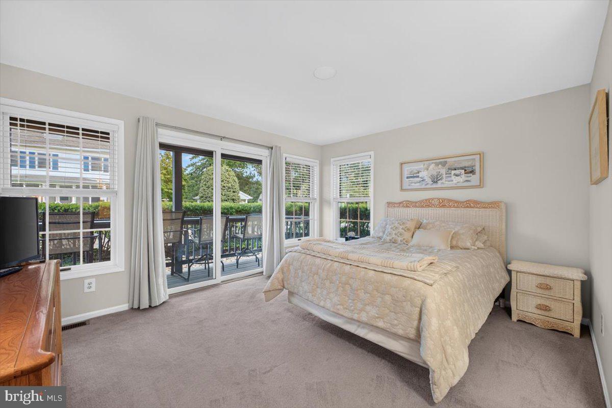 1 Bayview Road, Unit 19A Betterton, MD 21610 - Photo 21 of 58 Primary Bedroom with sliders to Covered Porch