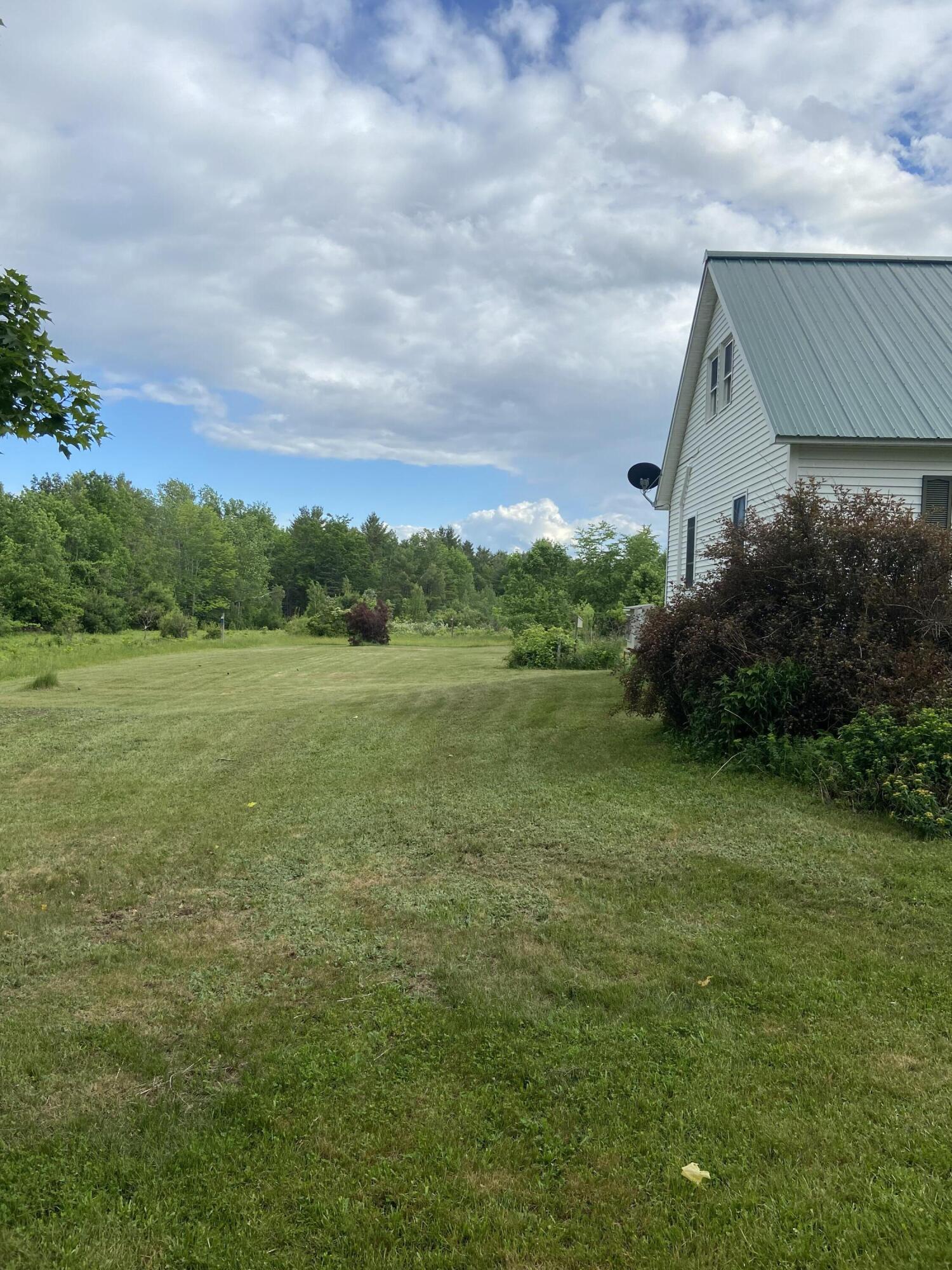 889 Mullen Road Stetson, ME 04488 - Photo 36 of 44 Left side of house