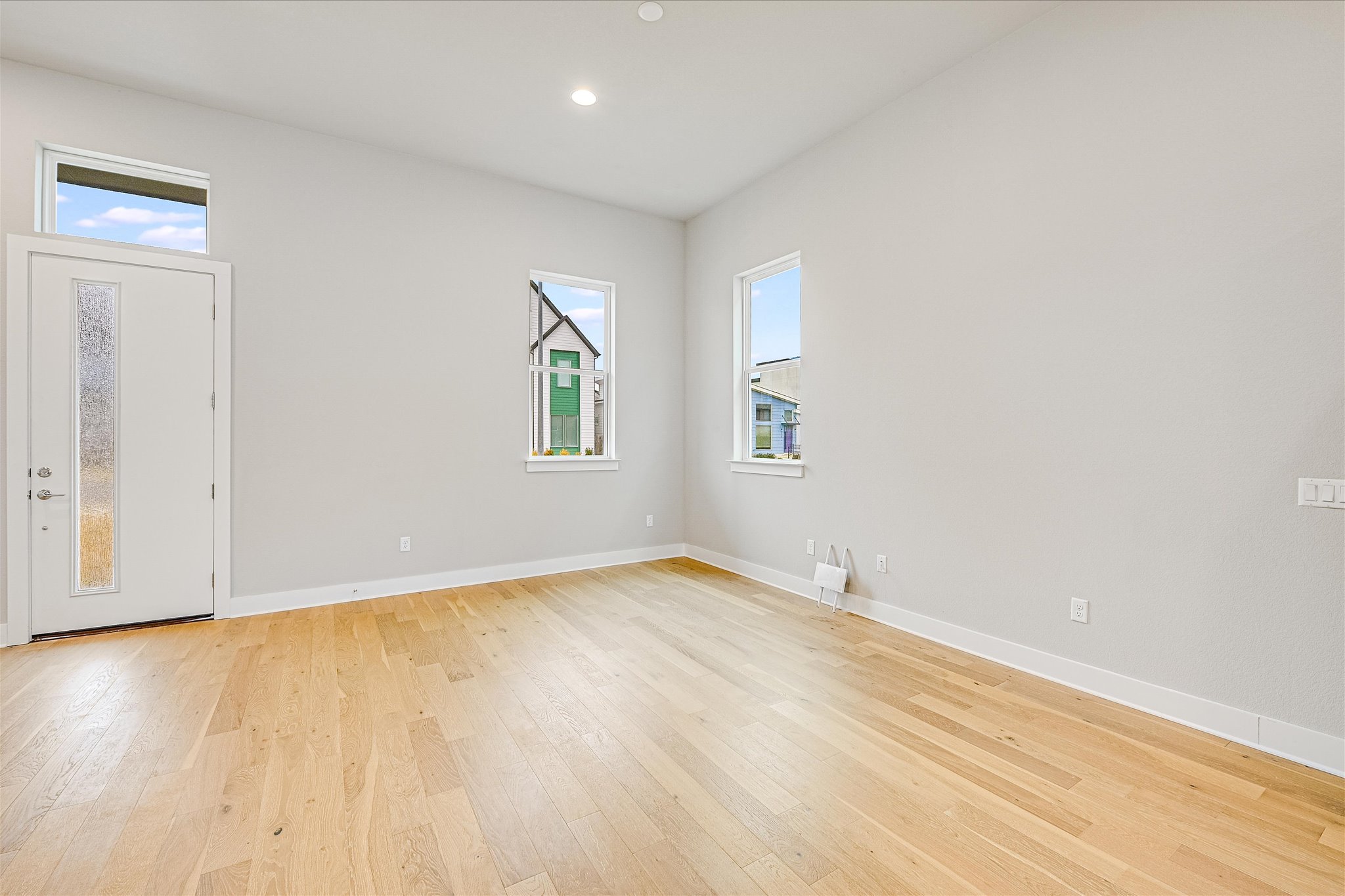 6136 Florencia Lane Austin, TX 78724 - Photo 5 of 40 Foyer featuring light wood-style flooring and recessed lighting