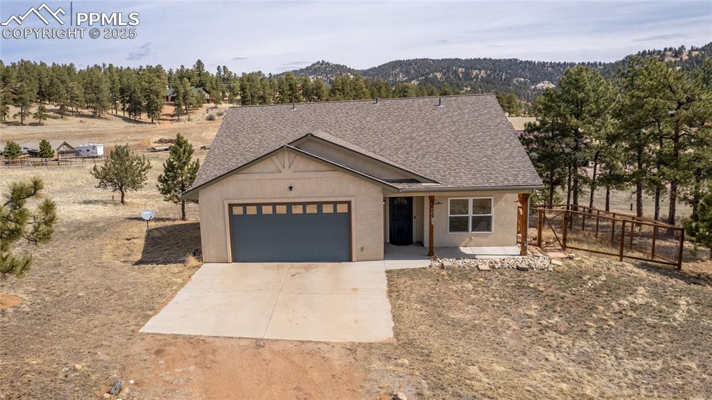 2649 Southpark Road Florissant, CO 80816 - Photo 1 of 42 a view of a house with a outdoor space