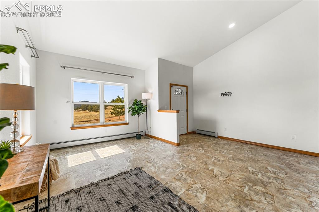 2649 Southpark Road Florissant, CO 80816 - Photo 6 of 42 a view of an empty room and a window