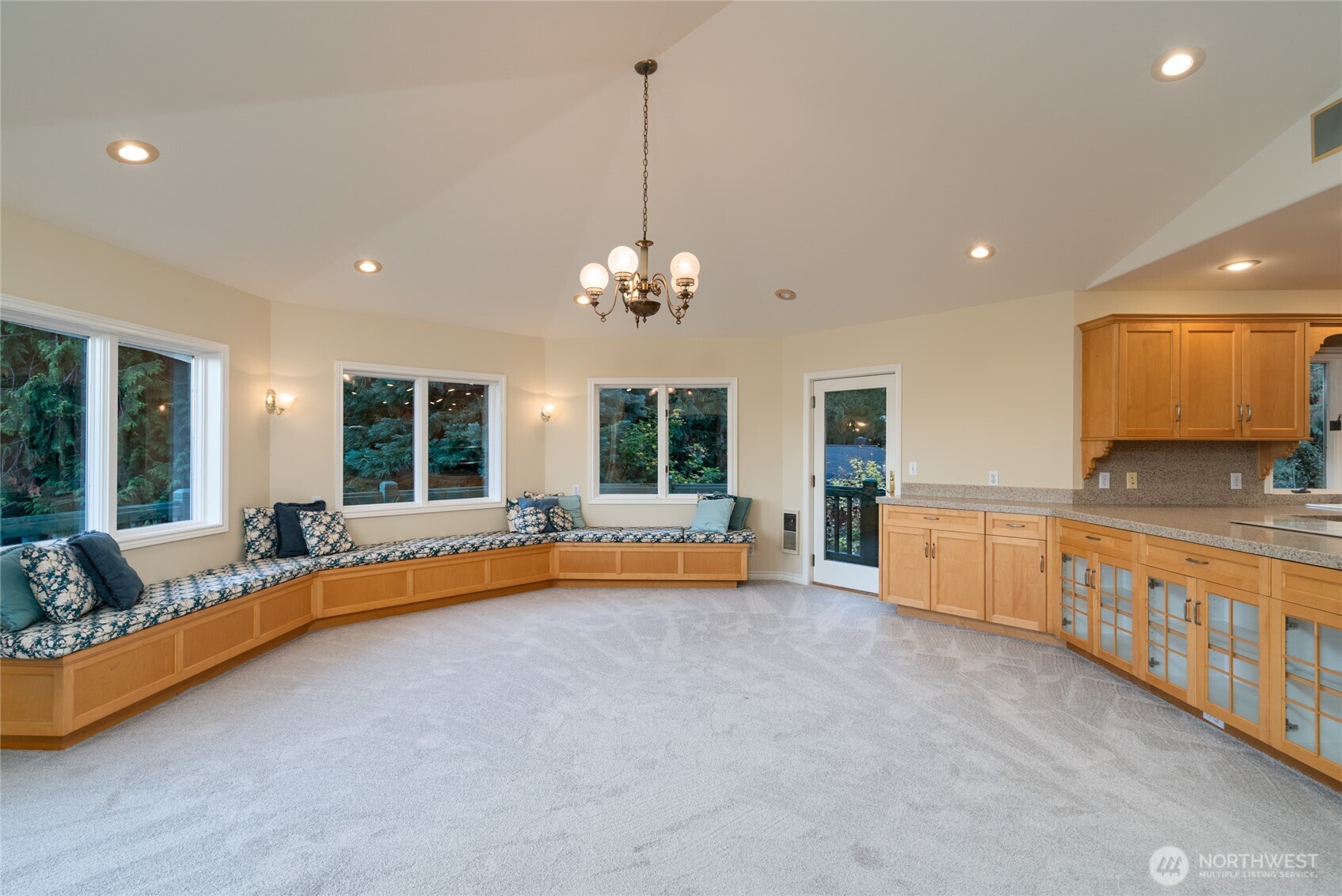 476 Nez Perce Place La Conner, WA 98257 - Photo 14 of 40 a view of a living room and chandelier in the kitchen