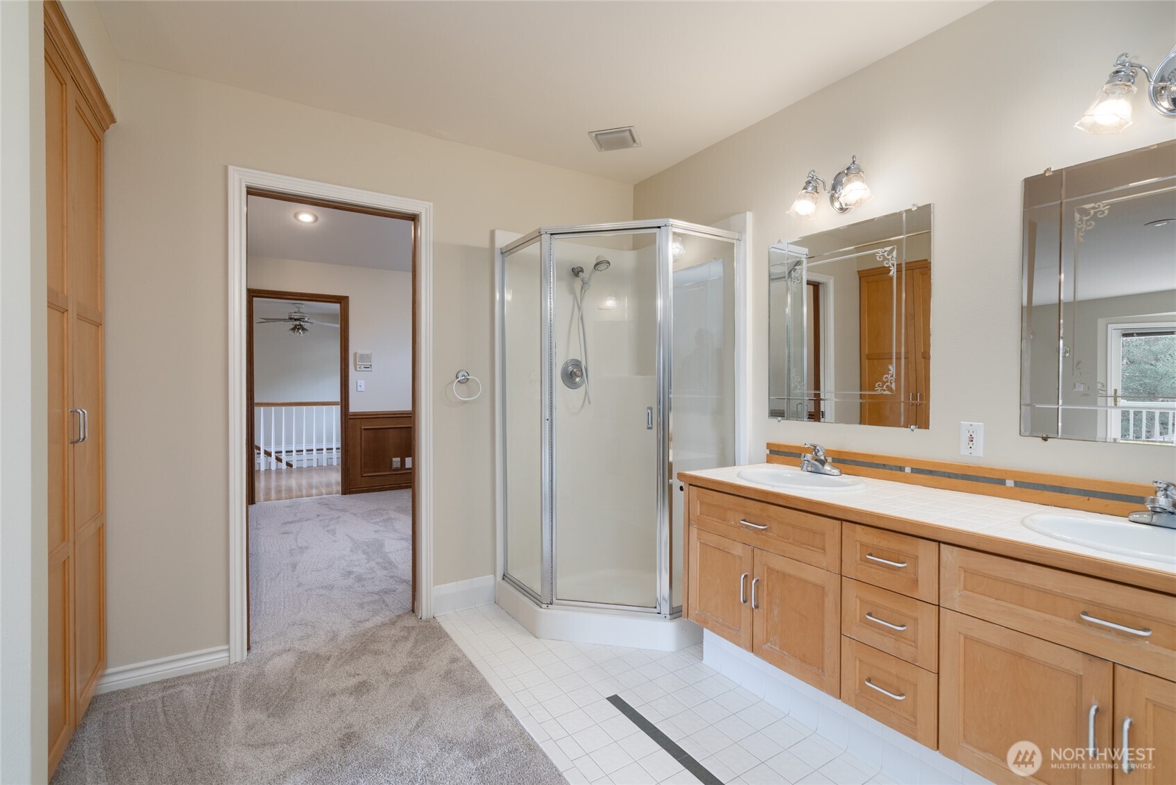 476 Nez Perce Place La Conner, WA 98257 - Photo 21 of 40 a spacious bathroom with a shower sink and mirror