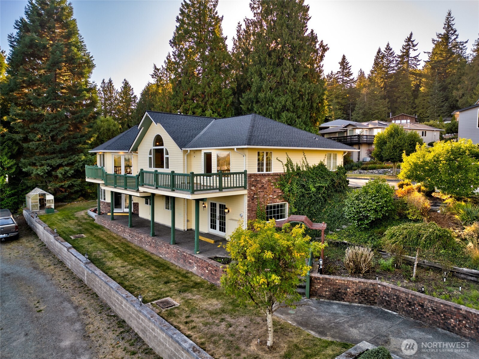 476 Nez Perce Place La Conner, WA 98257 - Photo 3 of 40 a house with trees in the background