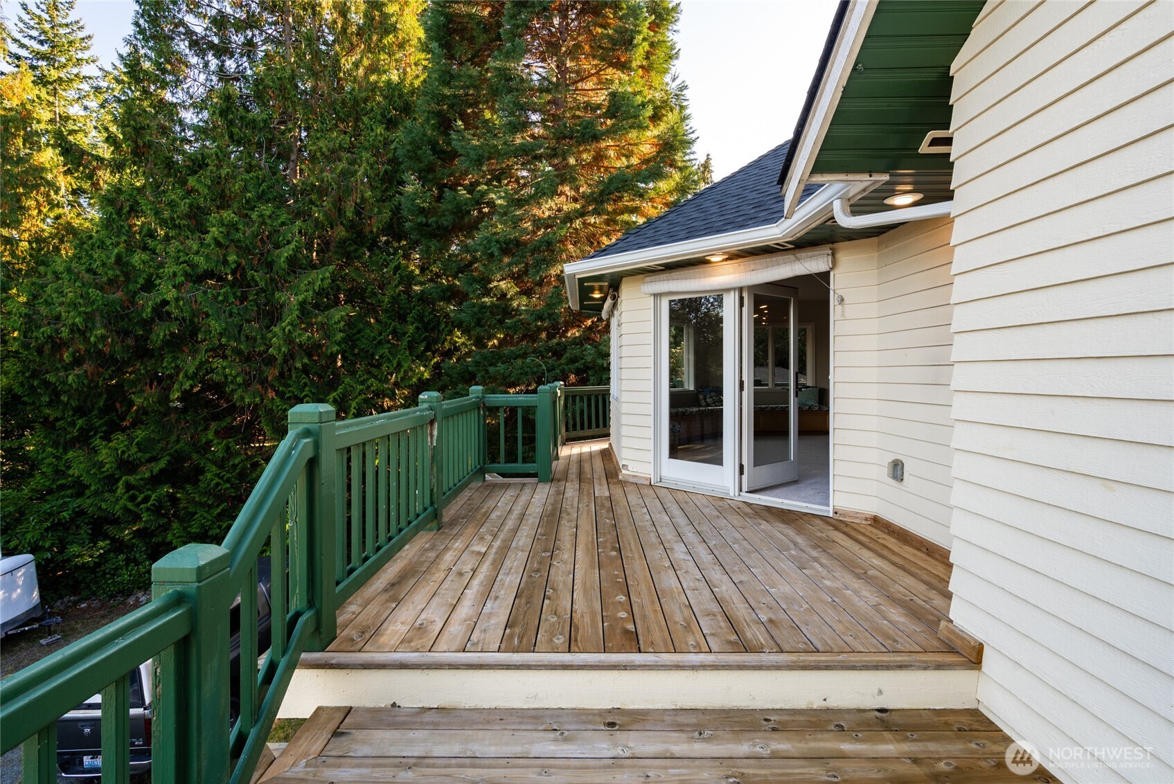476 Nez Perce Place La Conner, WA 98257 - Photo 35 of 40 a view of backyard with deck and outdoor seating