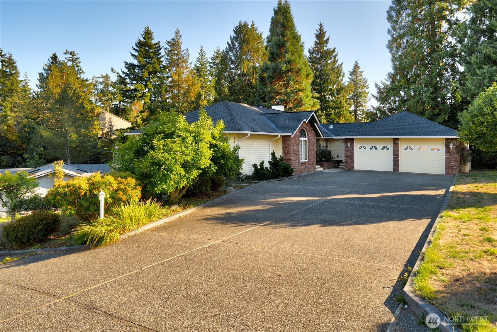 476 Nez Perce Place La Conner, WA 98257 - Photo 39 of 40 a view of a house with a yard and potted plants