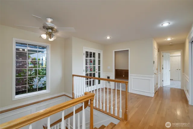 wooden floor in an empty room with a window and wooden floor