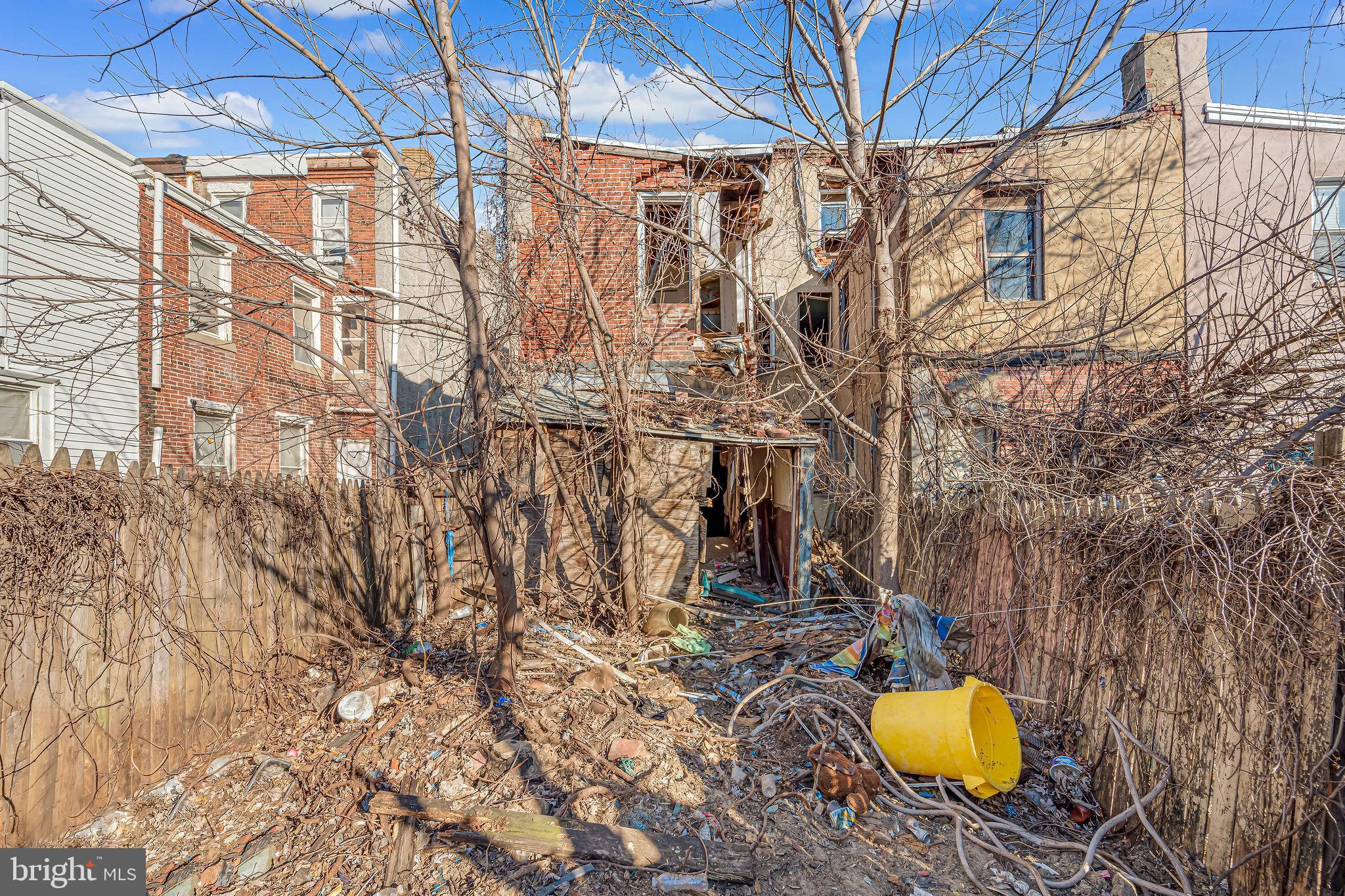 542 York Street Camden, NJ 08102 - Photo 11 of 11 a backyard of a house with table and chairs