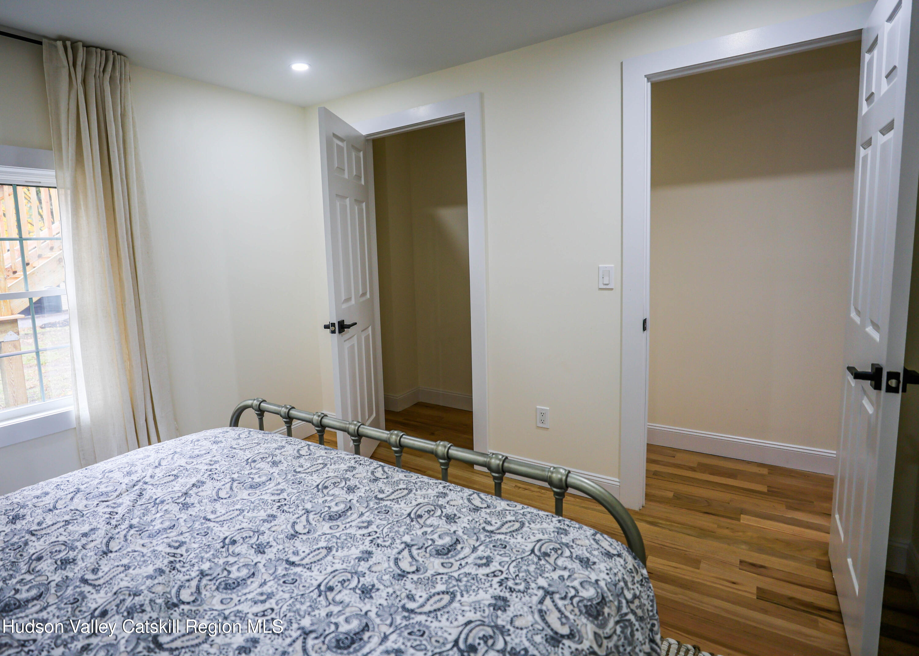 169 West Saugerties Road Saugerties, NY 12477 - Photo 11 of 43 a bedroom with a bed and a window