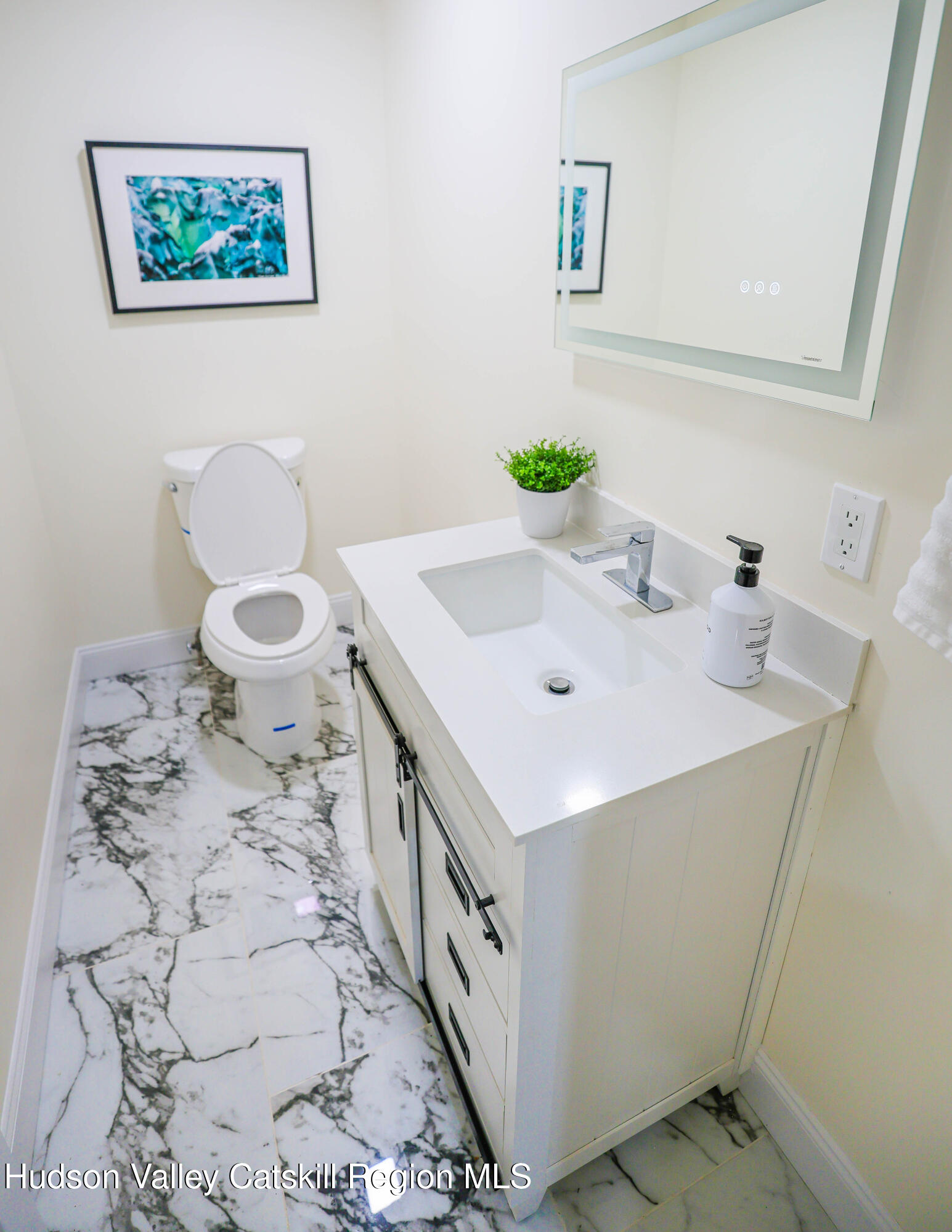 169 West Saugerties Road Saugerties, NY 12477 - Photo 14 of 43 a bathroom with a sink and a toilet