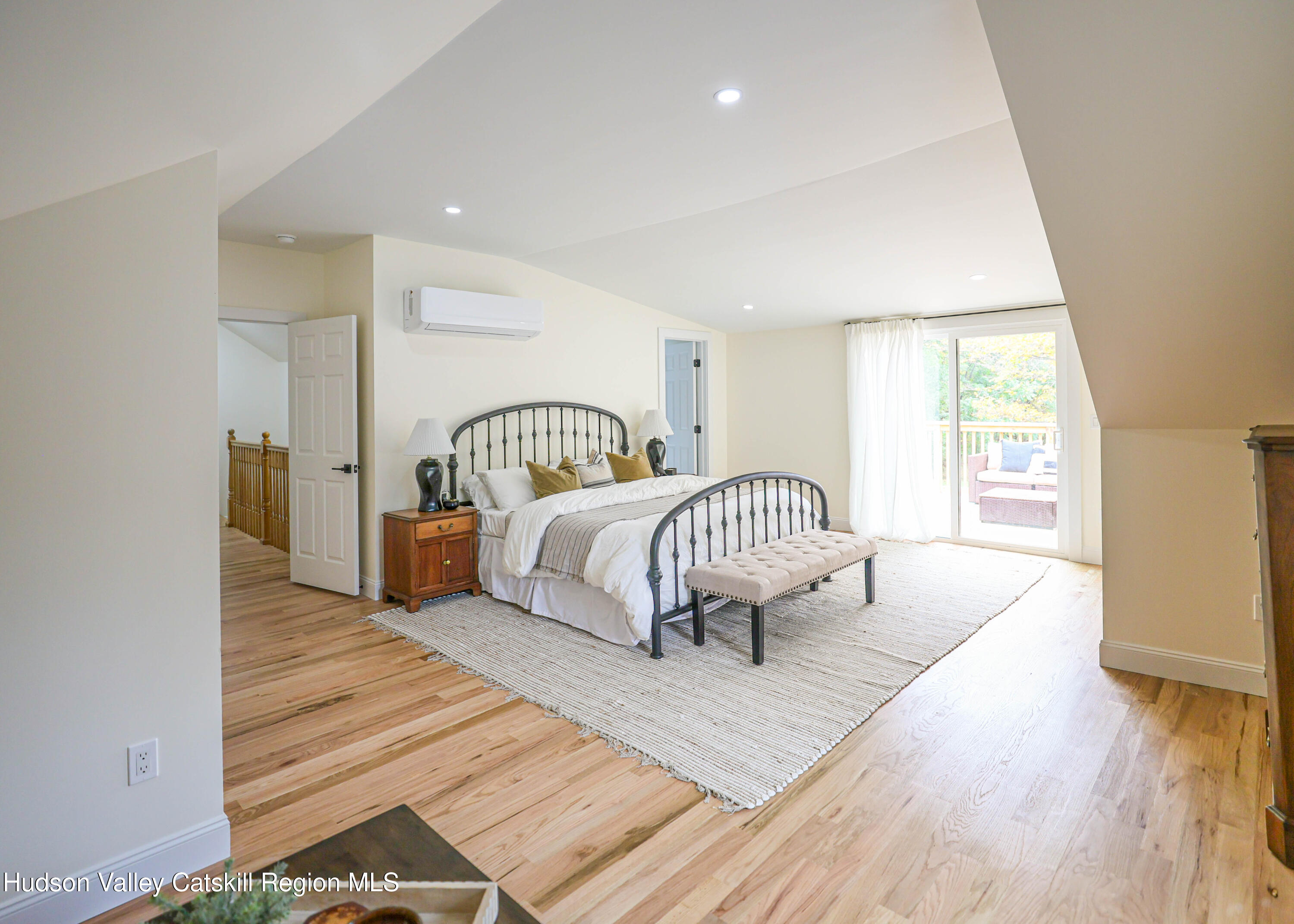 169 West Saugerties Road Saugerties, NY 12477 - Photo 21 of 43 a bedroom with a bed and a large window