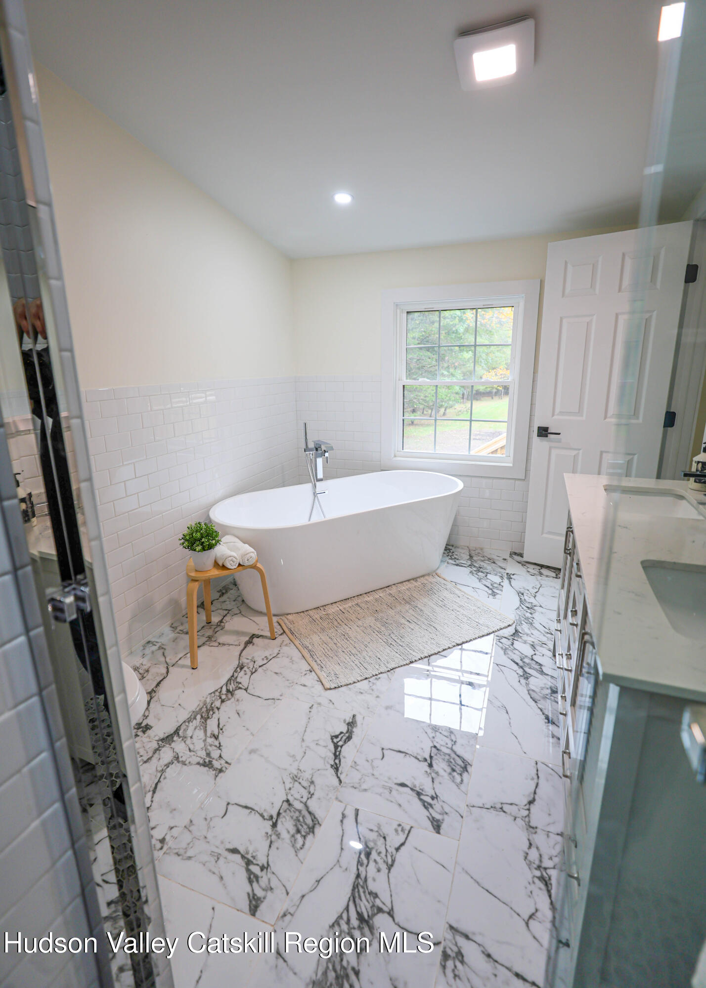 169 West Saugerties Road Saugerties, NY 12477 - Photo 25 of 43 a spacious bathroom with a bathtub and shower