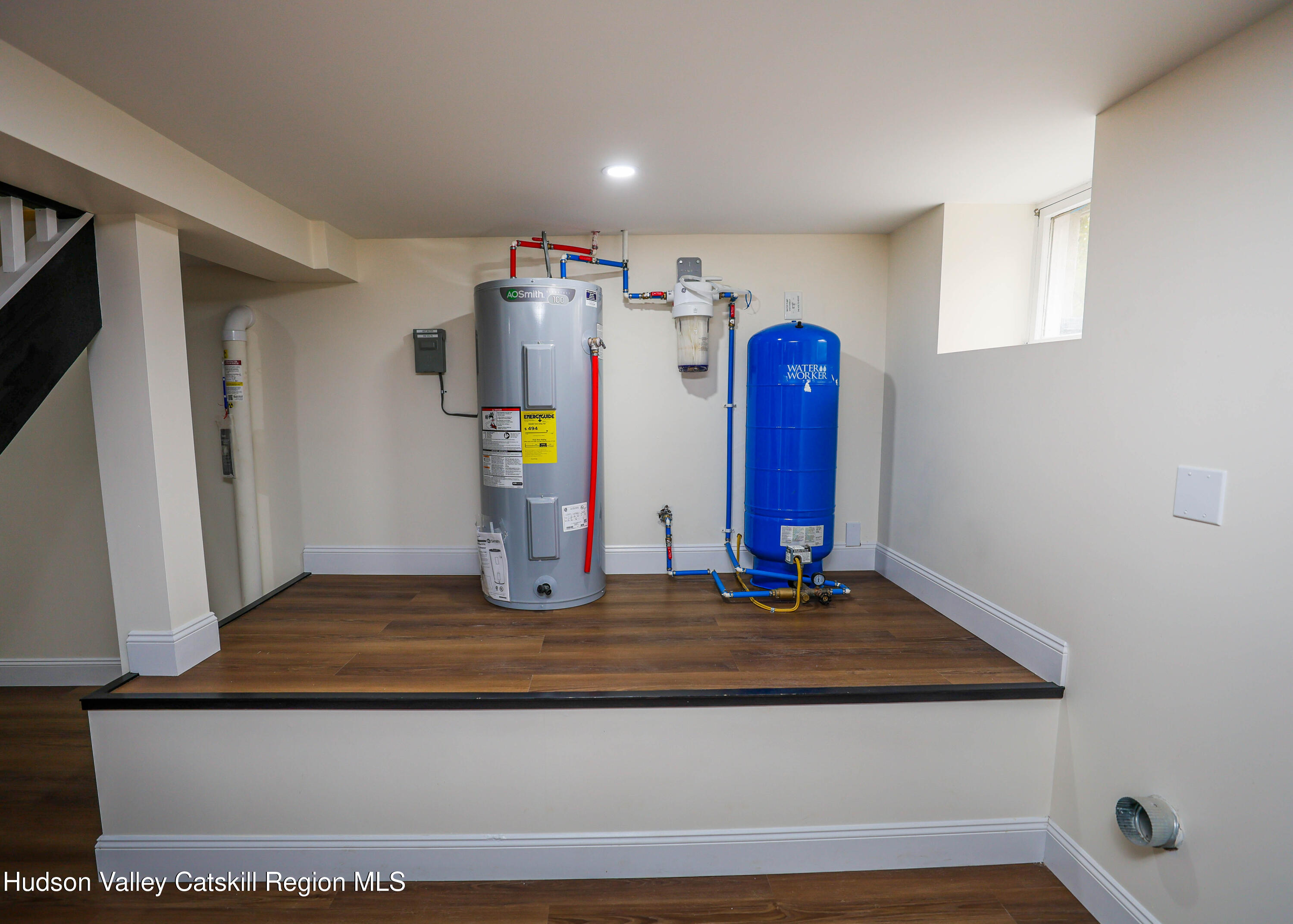 169 West Saugerties Road Saugerties, NY 12477 - Photo 33 of 43 a view of a livingroom with wooden floor and ceiling fan
