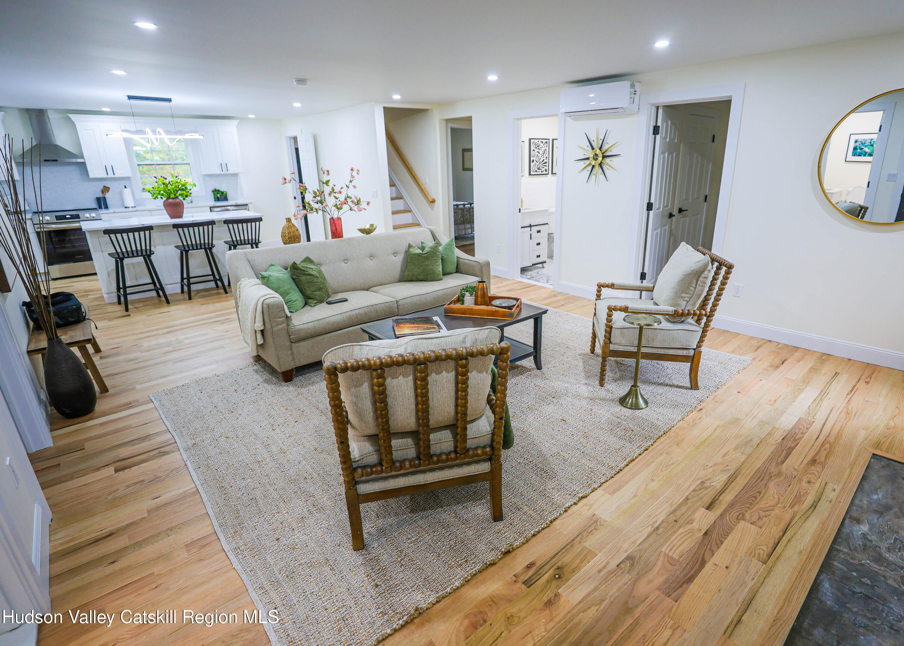 169 West Saugerties Road Saugerties, NY 12477 - Photo 5 of 43 a living room with furniture a wooden floor and next to a window