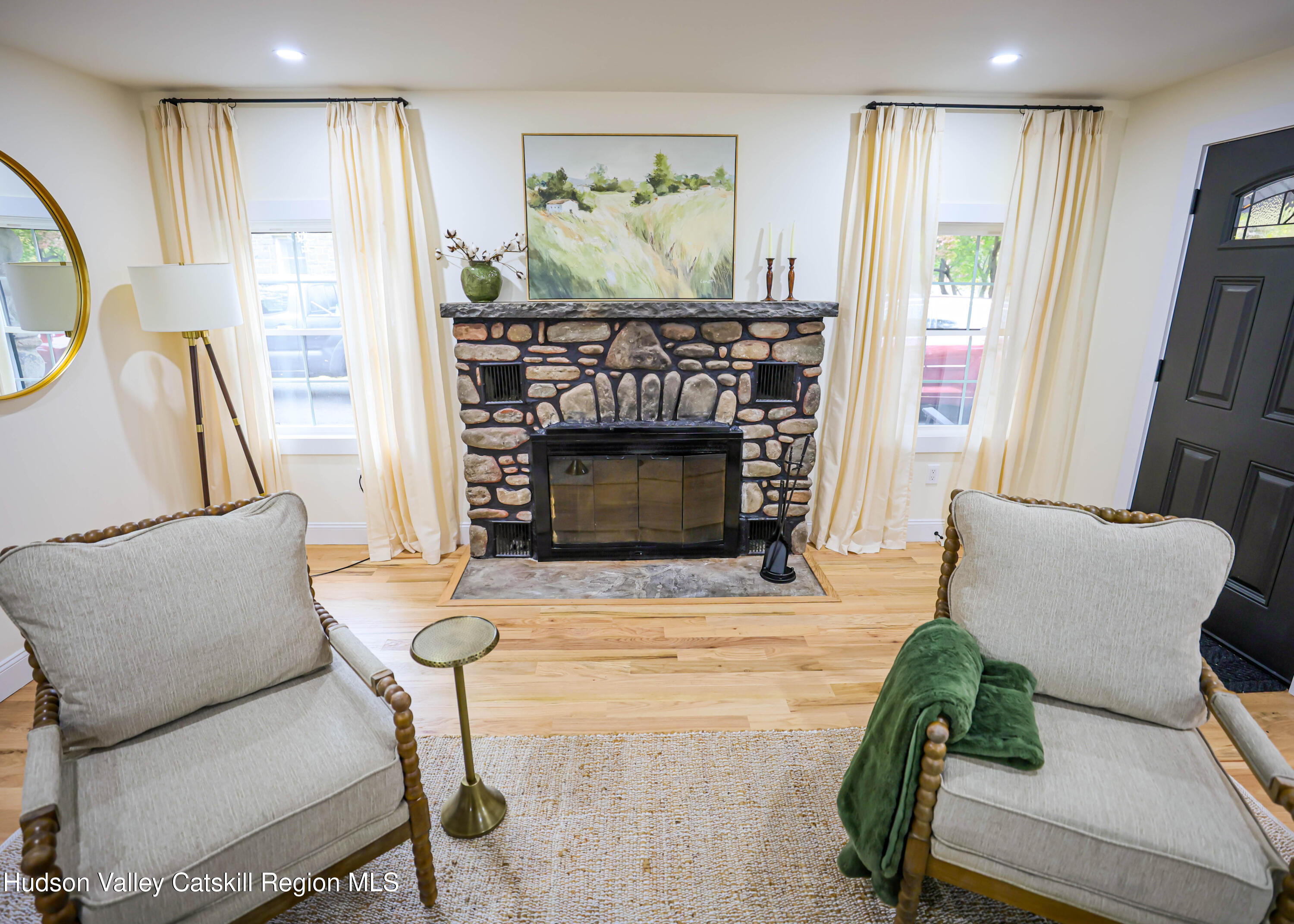 169 West Saugerties Road Saugerties, NY 12477 - Photo 6 of 43 a living room with furniture and a fireplace