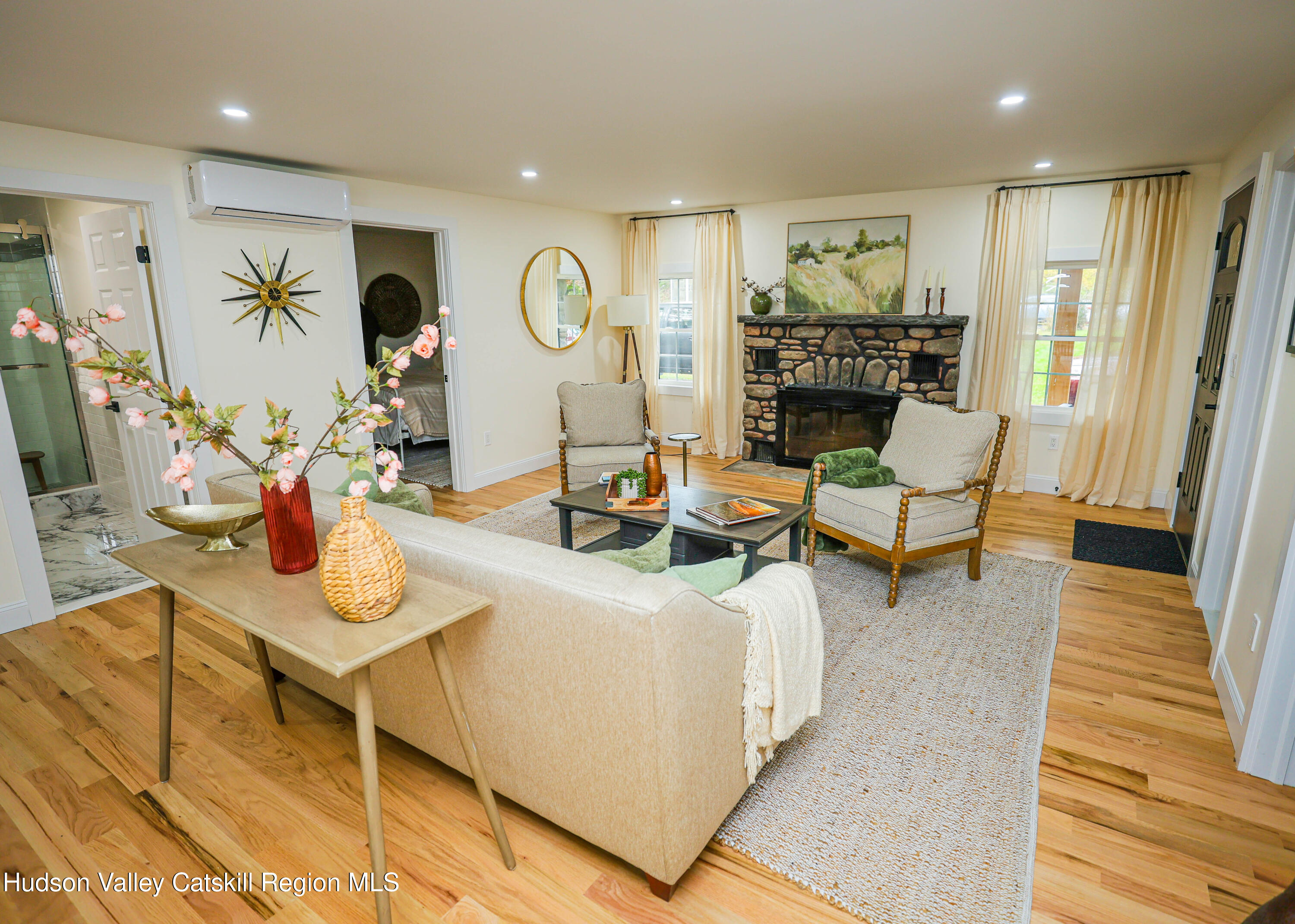 169 West Saugerties Road Saugerties, NY 12477 - Photo 7 of 43 a living room with furniture and a fireplace