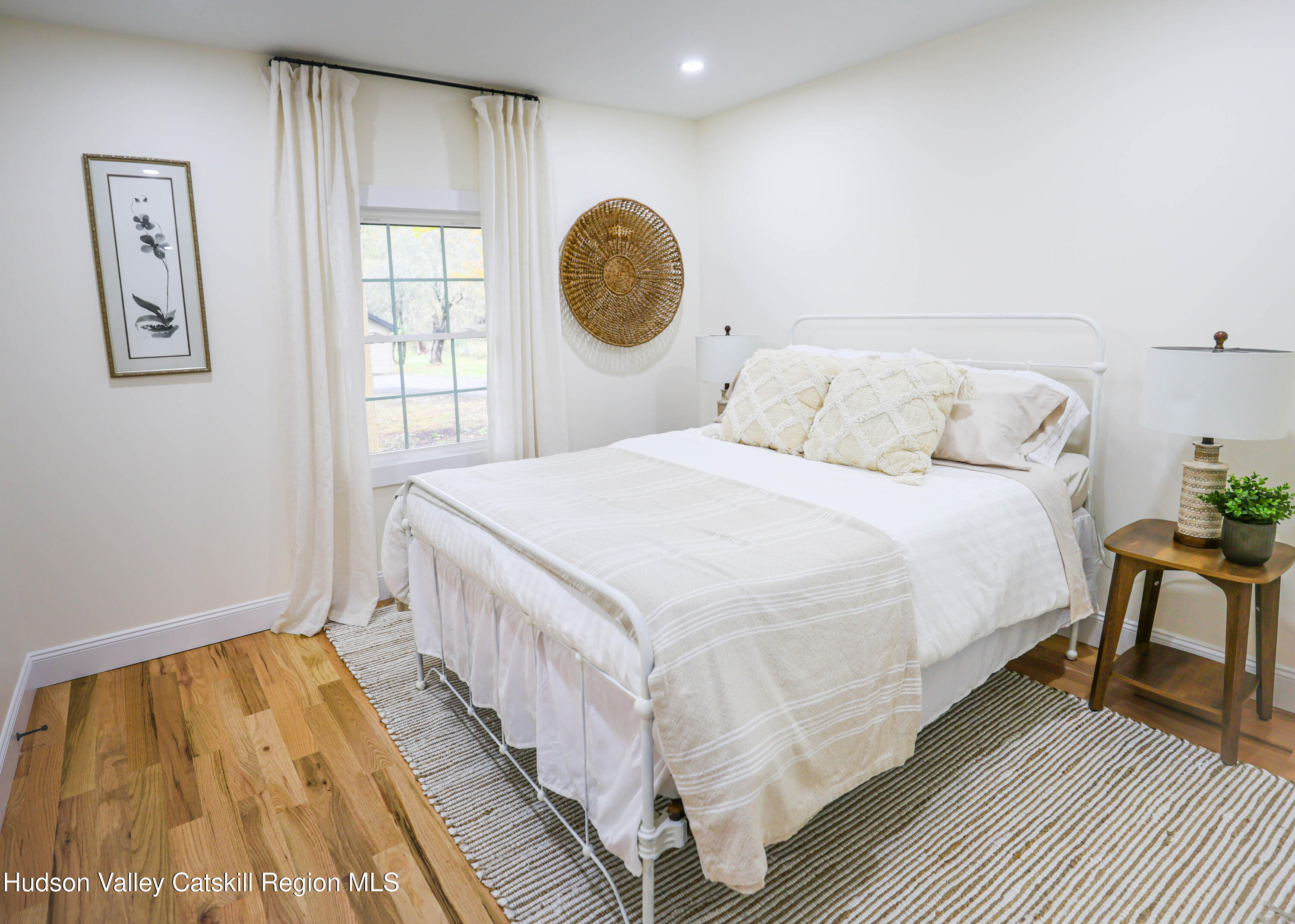 169 West Saugerties Road Saugerties, NY 12477 - Photo 8 of 43 a bedroom with a bed and a window