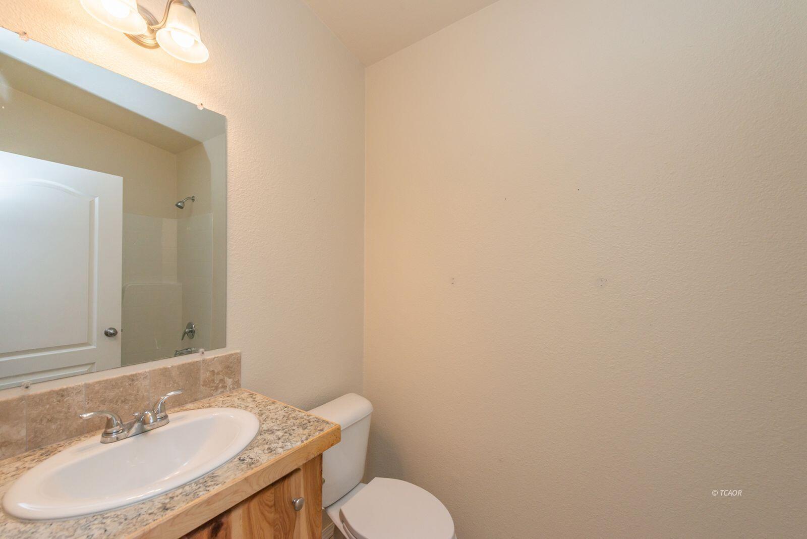 38500 Highway 299 Junction City, CA 96048 - Photo 23 of 49 a bathroom with a sink and a mirror