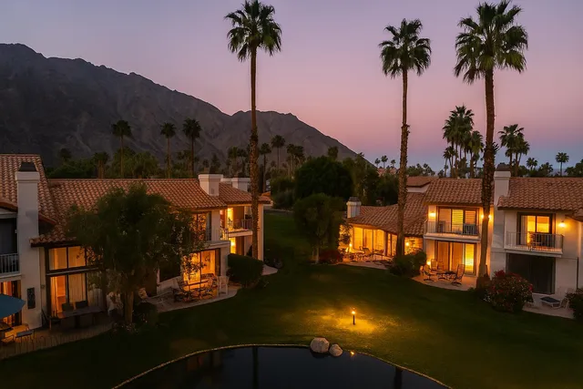 swimming pool view with a lake view