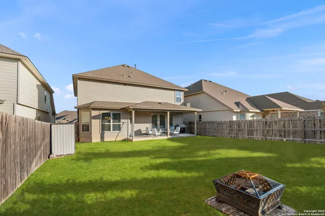 a backyard of a house with yard and green space