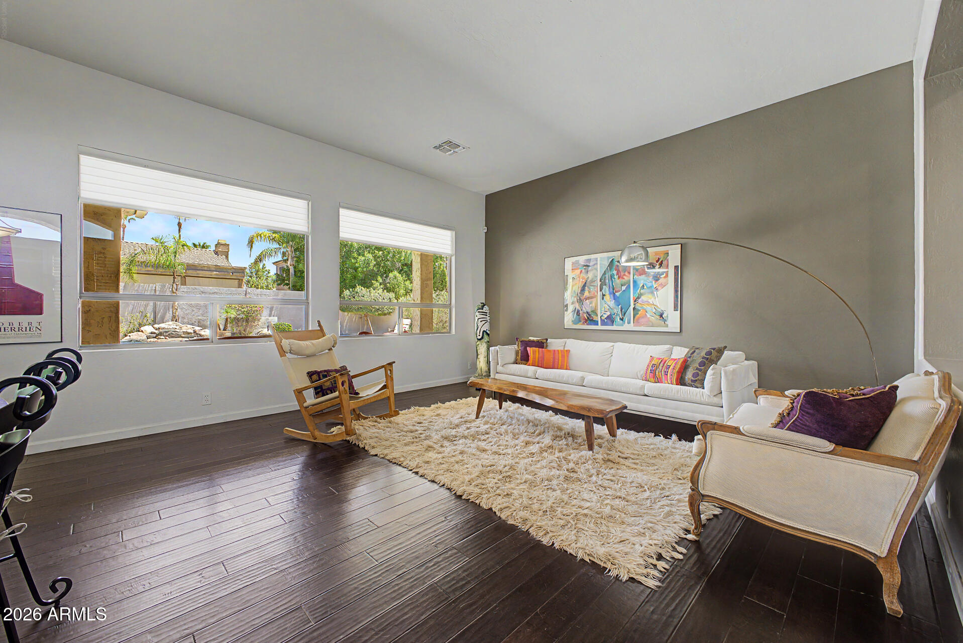 1632 West Frye Road Phoenix, AZ 85045 - Photo 7 of 37 a living room with furniture and a wooden floor
