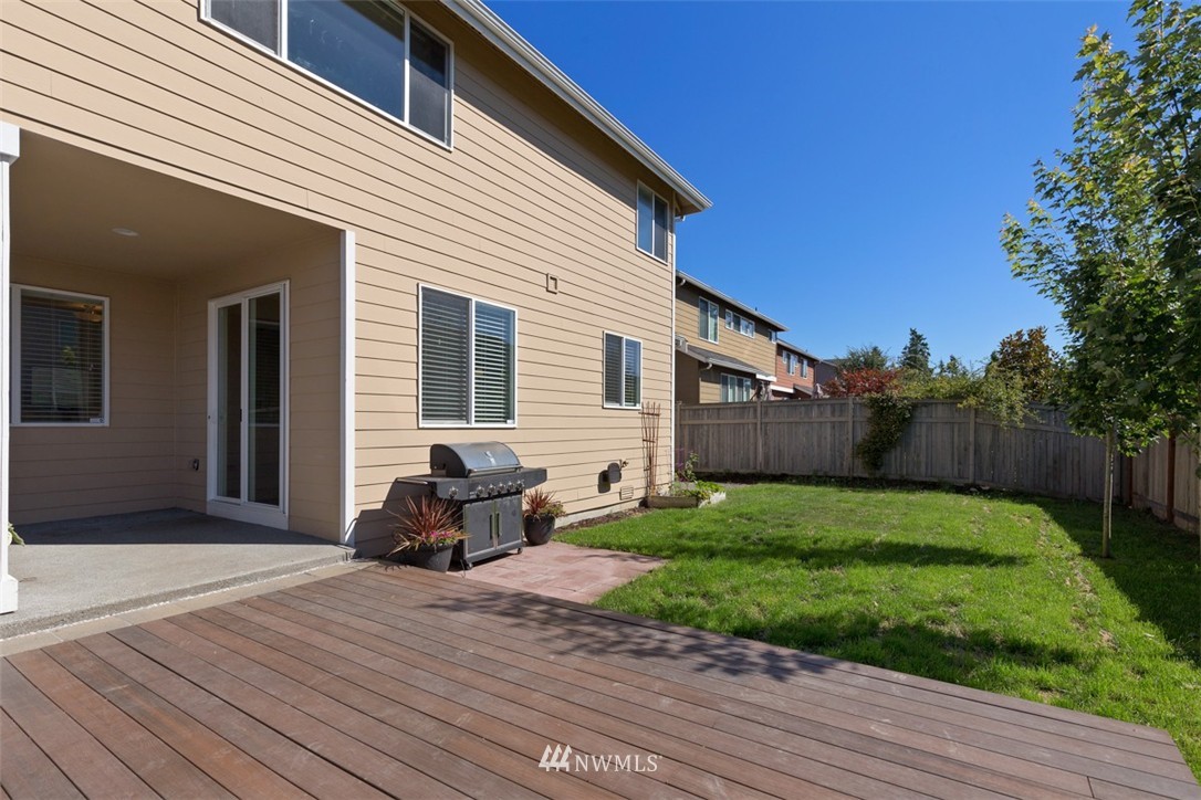 233 Chelan Avenue Northeast Renton, WA 98059 - Photo 16 of 16 a front view of a house with garden