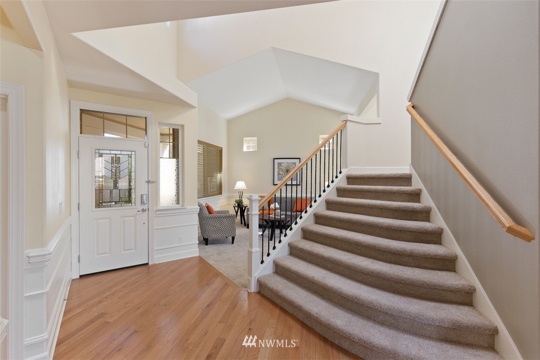 233 Chelan Avenue Northeast Renton, WA 98059 - Photo 3 of 16 a view of entryway and hall with wooden floor