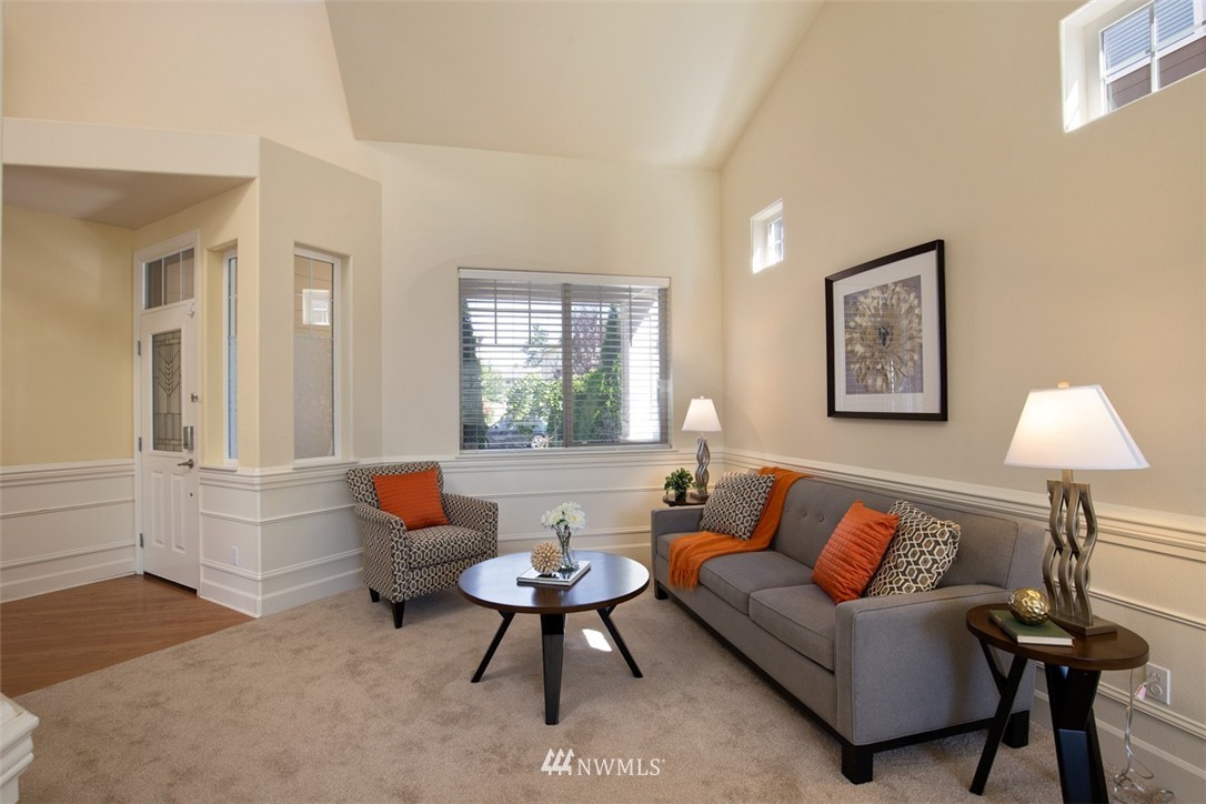 233 Chelan Avenue Northeast Renton, WA 98059 - Photo 4 of 16 a living room with furniture and a potted plant
