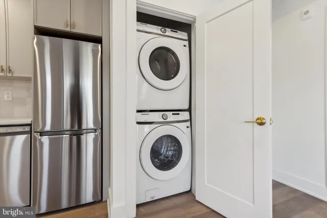 a utility room with dryer and washer
