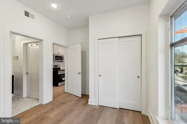 a view of entryway with wooden floor