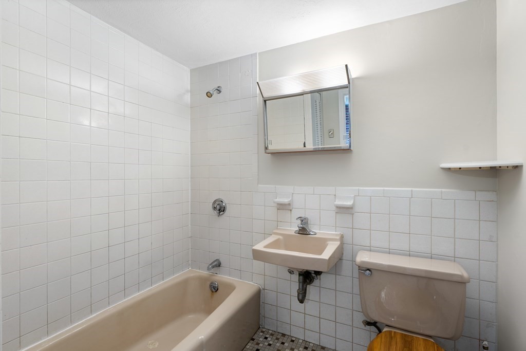 7 Wampus Avenue, Unit 15 Acton, MA 01720 - Photo 12 of 30 a bathroom with a sink toilet and bathtub