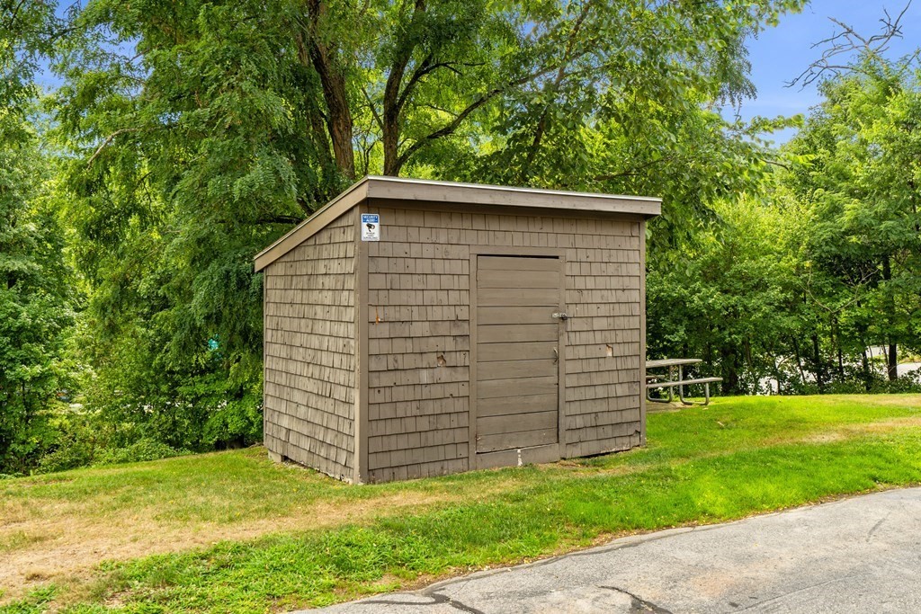 7 Wampus Avenue, Unit 15 Acton, MA 01720 - Photo 27 of 30 a view of a backyard of the house