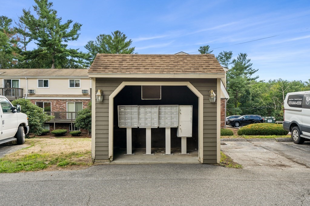 7 Wampus Avenue, Unit 15 Acton, MA 01720 - Photo 30 of 30 a view of house with outdoor space and parking