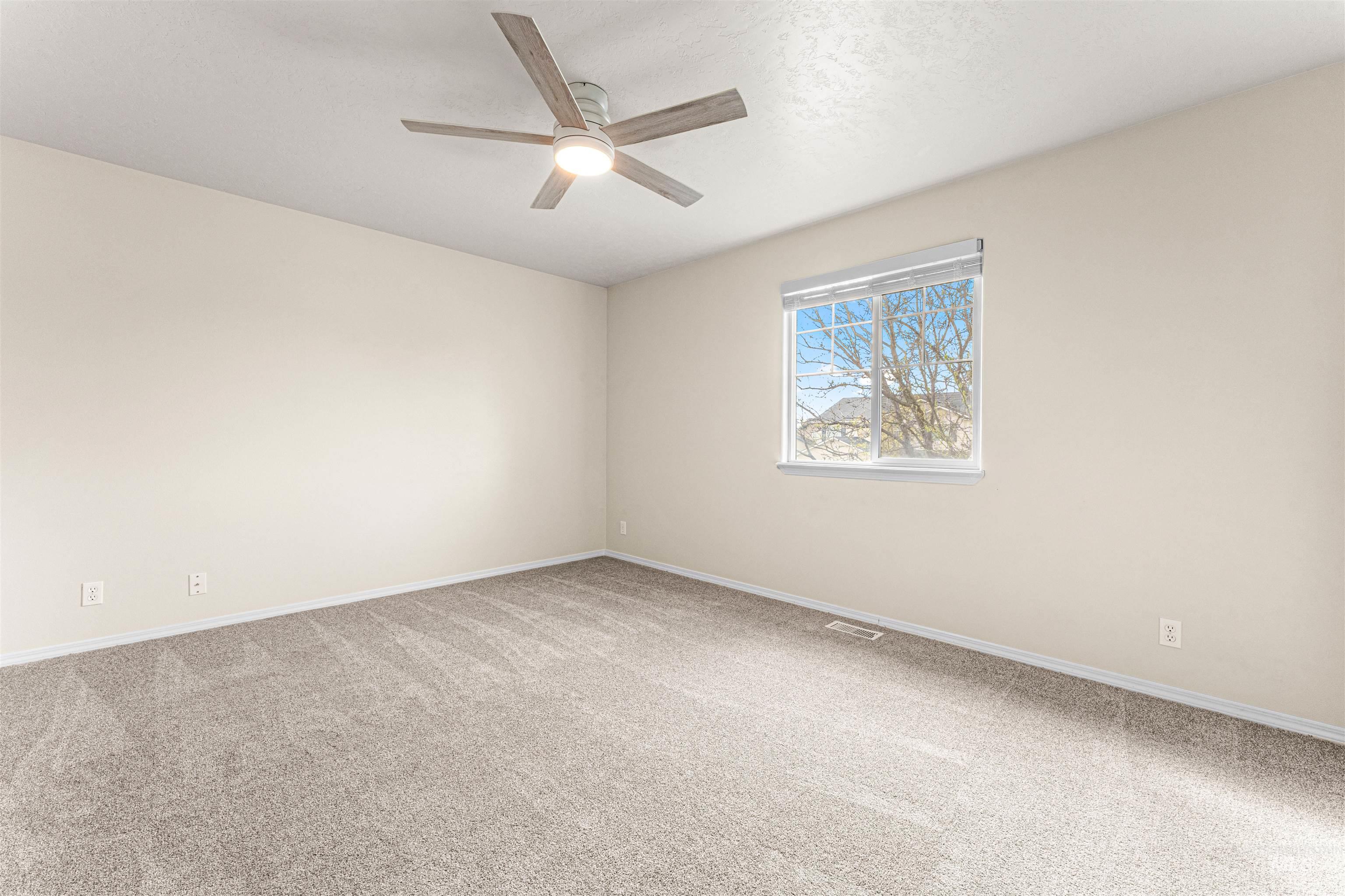 2503 Carnegie Street Caldwell, ID 83607 - Photo 16 of 20 Unfurnished room featuring carpet and ceiling fan