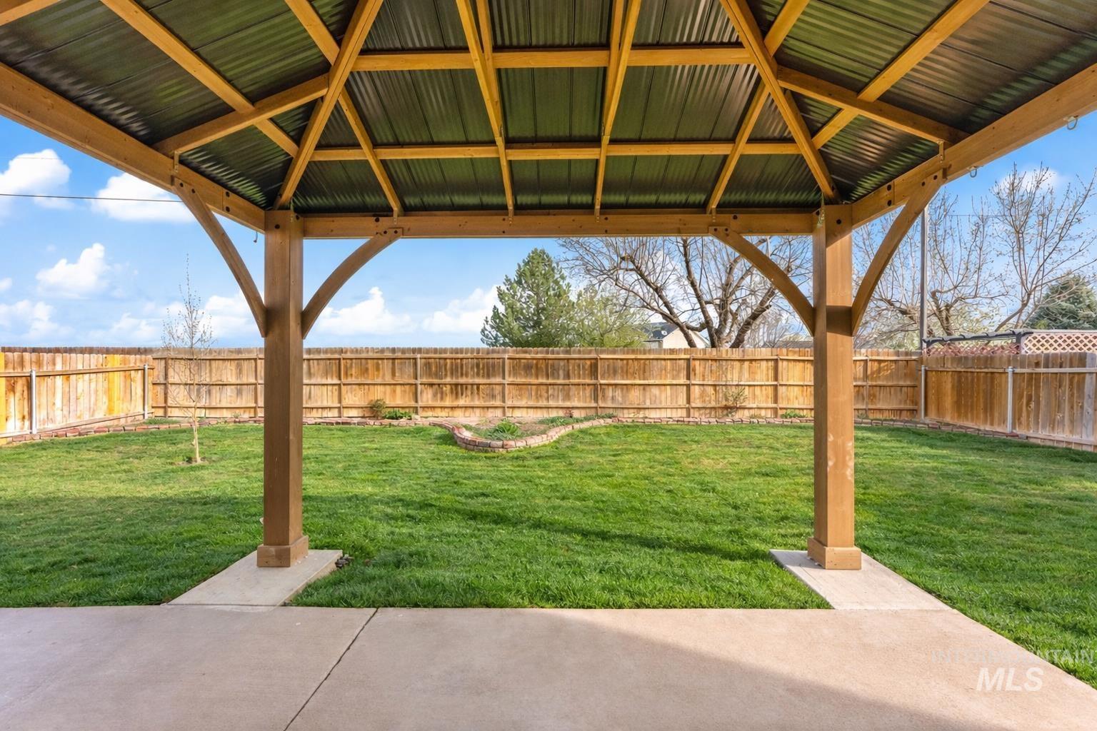 2503 Carnegie Street Caldwell, ID 83607 - Photo 18 of 20 Fenced backyard with a patio