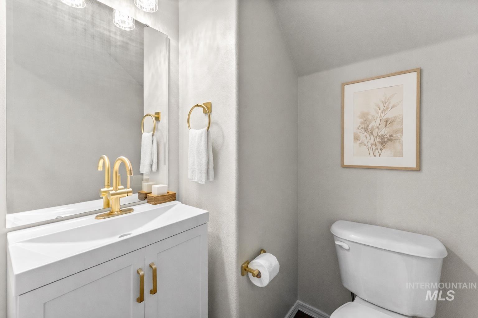 2503 Carnegie Street Caldwell, ID 83607 - Photo 8 of 20 Bathroom featuring vanity and vaulted ceiling