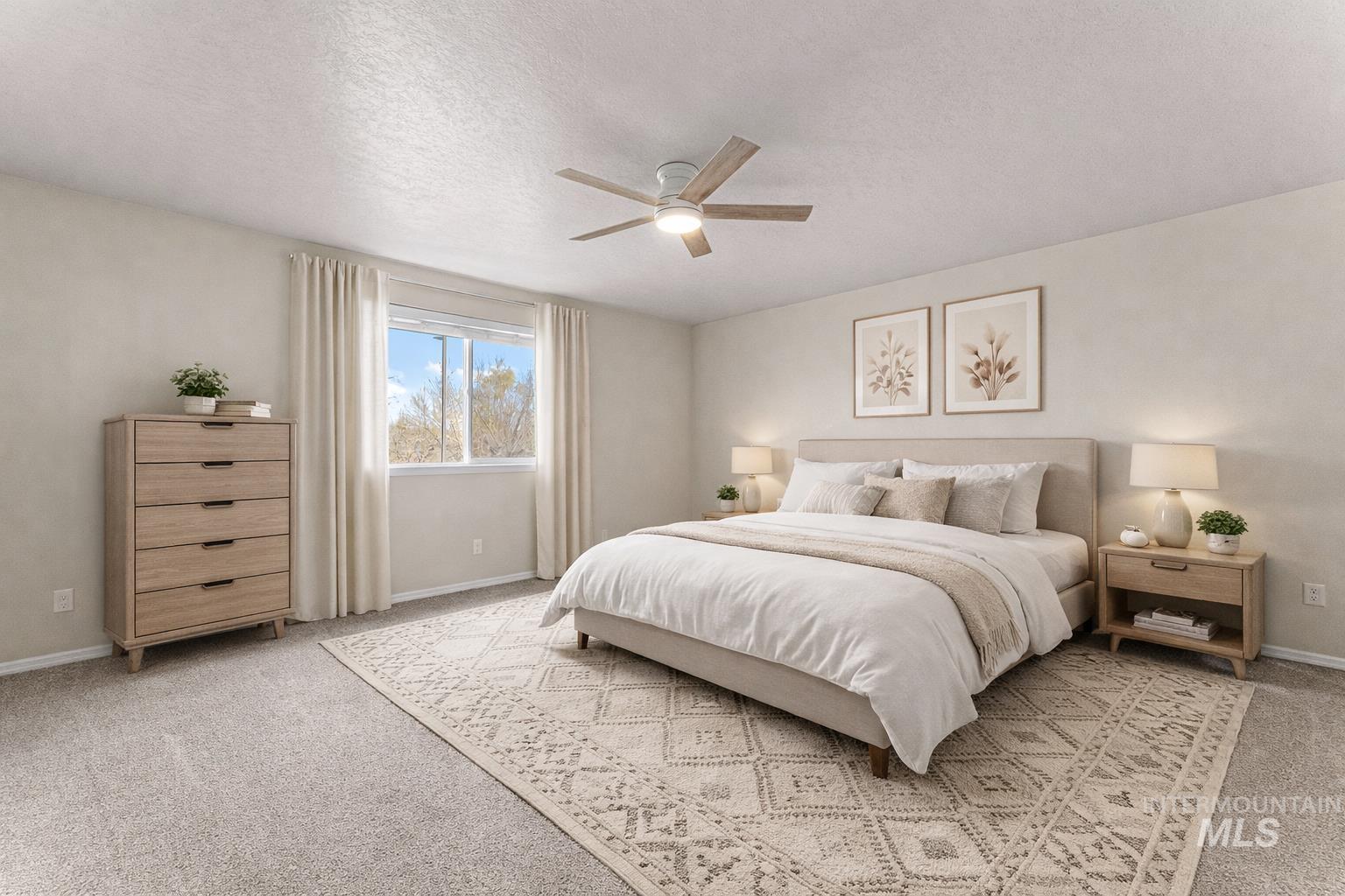 2503 Carnegie Street Caldwell, ID 83607 - Photo 9 of 20 Bedroom with light carpet, ceiling fan, and a textured ceiling