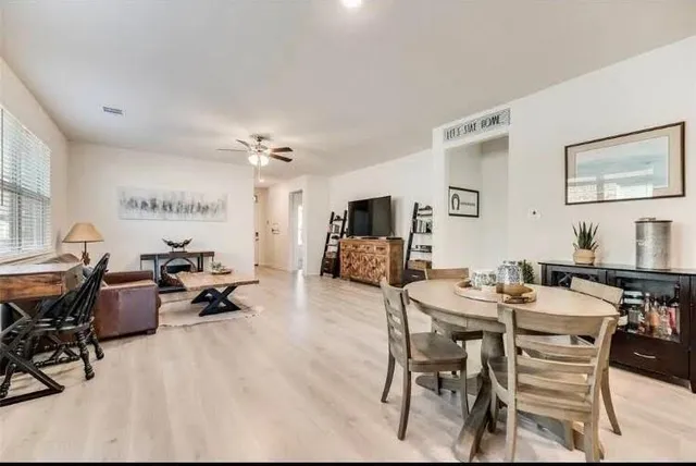 a view of a dining room with furniture