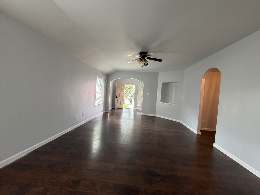 2902 Back Bay Brook Trail Houston, TX 77045 - Photo 4 of 11 a view of empty room with wooden floor and fan