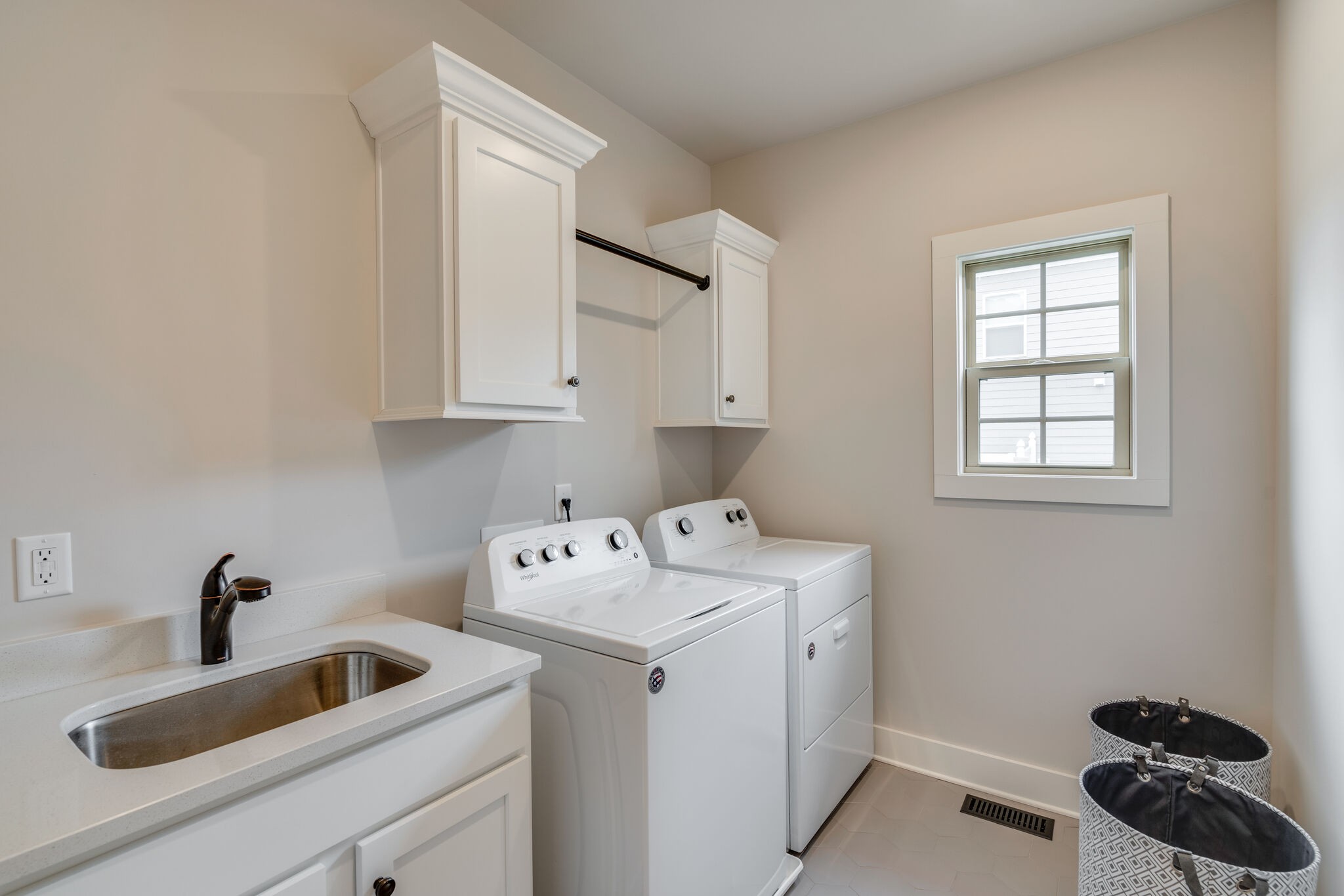 987 Carnation Drive Spring Hill, TN 37174 - Photo 14 of 26 a utility room with dryer and washer