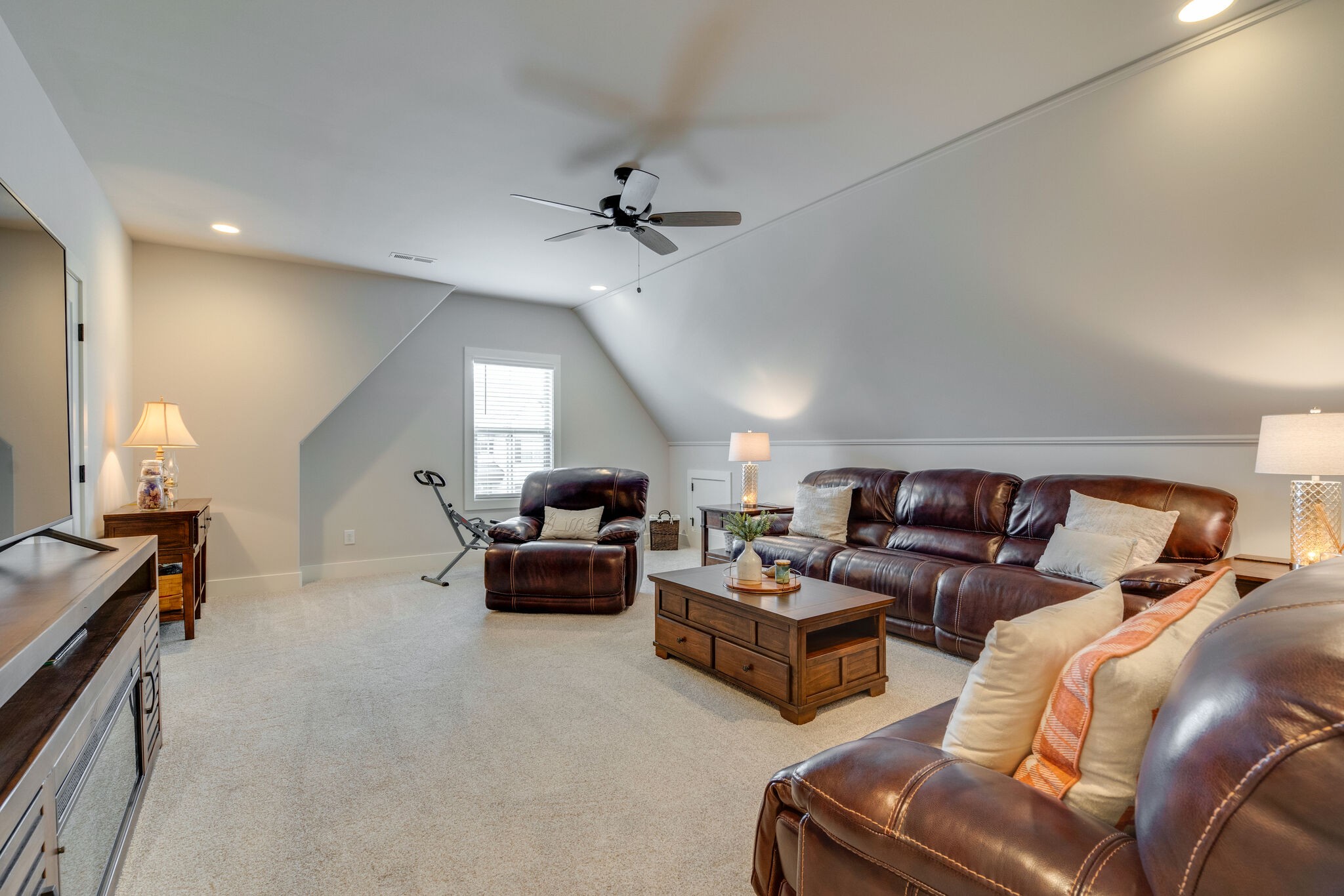 987 Carnation Drive Spring Hill, TN 37174 - Photo 19 of 26 a living room with furniture and a lamp