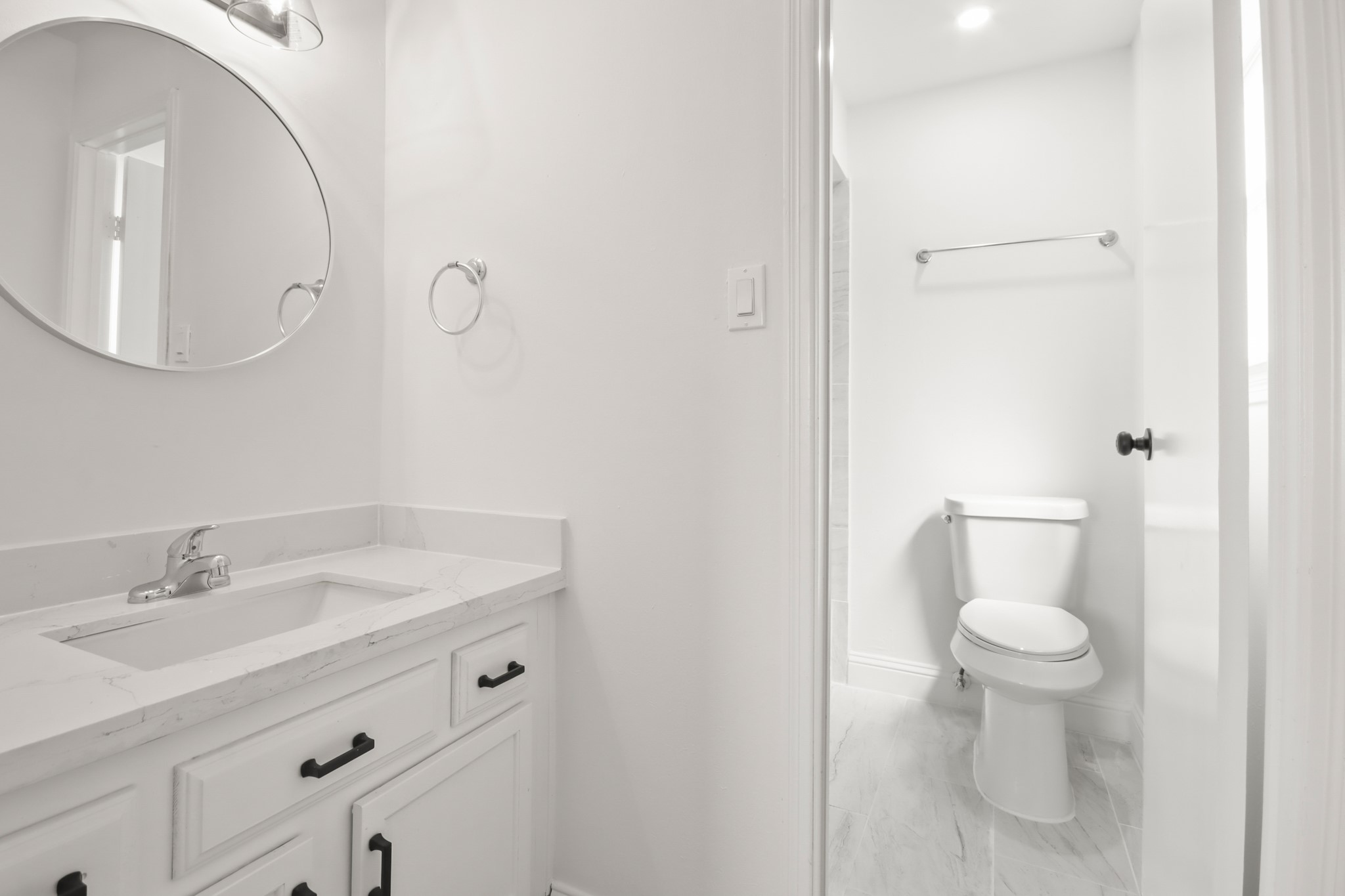 24127 Spring Fork Drive Spring, TX 77373 - Photo 11 of 17 Fresh and modern, this bathroom showcases a clean vanity design and well-appointed layout for everyday ease.