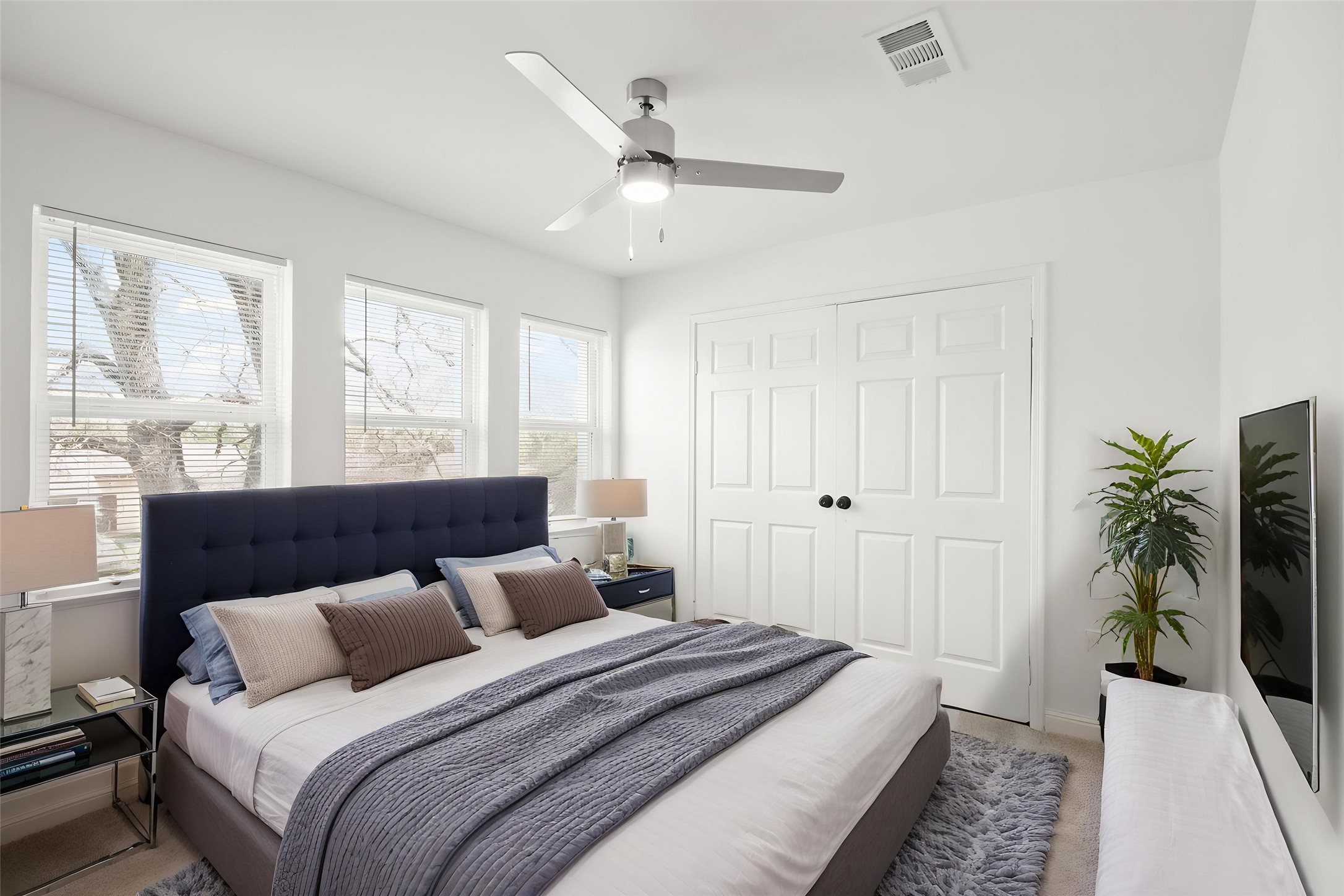 24127 Spring Fork Drive Spring, TX 77373 - Photo 14 of 17 Virtually Staged: Another generously sized bedroom featuring multiple windows, great closet space, and a relaxing atmosphere.