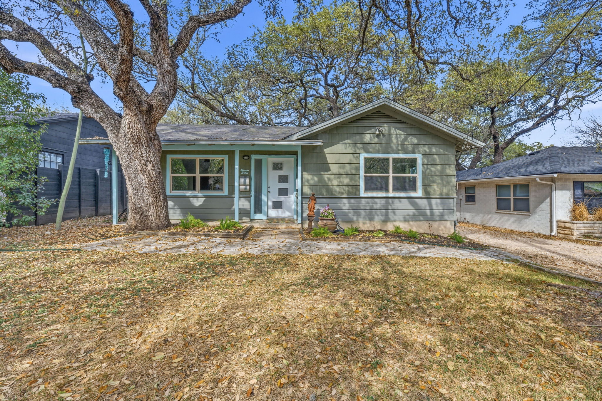 1112 Mission Ridge Austin, TX 78704 - Photo 1 of 1 front view of a house with a yard