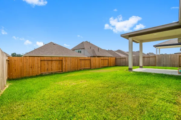 a view of a house with a big yard