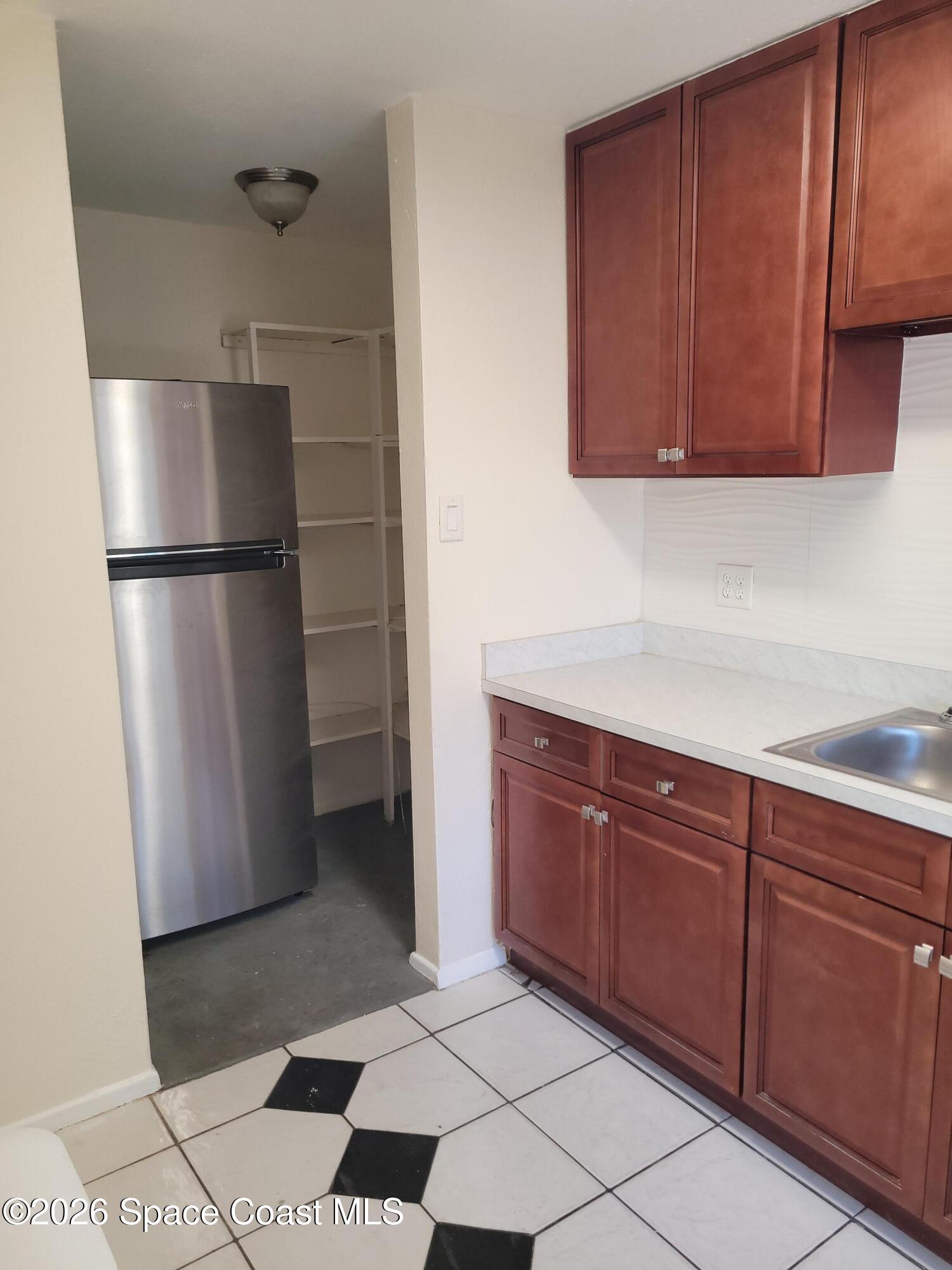 807 East Azalea Court Melbourne, FL 32935 - Photo 4 of 6 20260129_123404