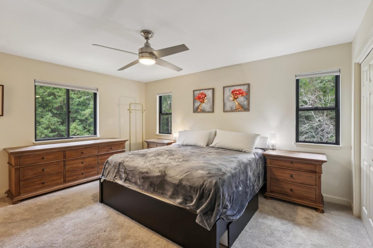 17386 Tressel Pass Road Boulder Creek, CA 95006 - Photo 16 of 41 a bedroom with a bed and a window