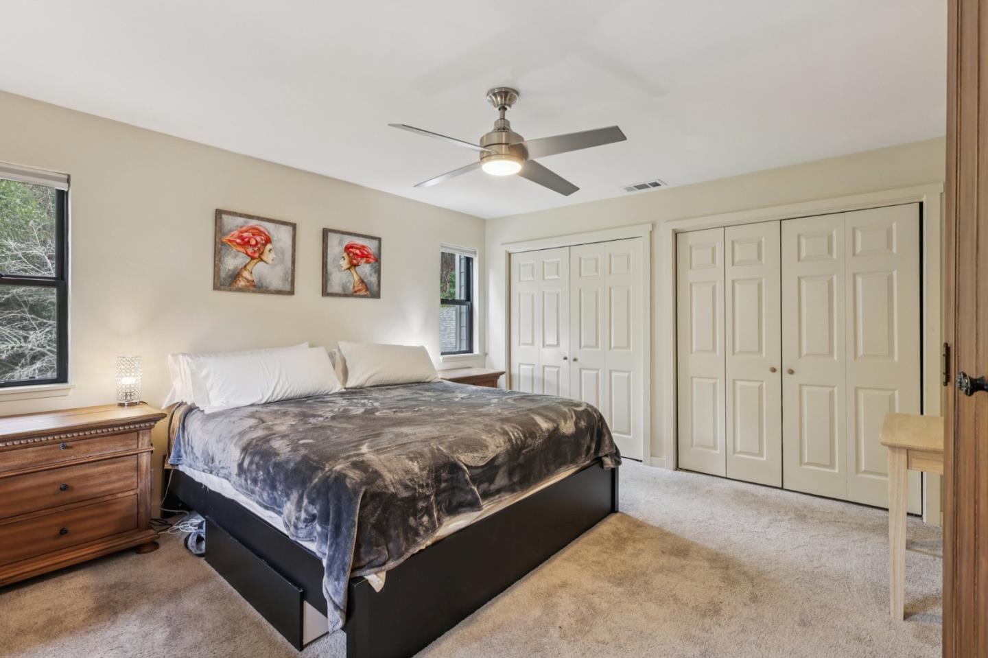 17386 Tressel Pass Road Boulder Creek, CA 95006 - Photo 17 of 41 a bedroom with a bed and a window