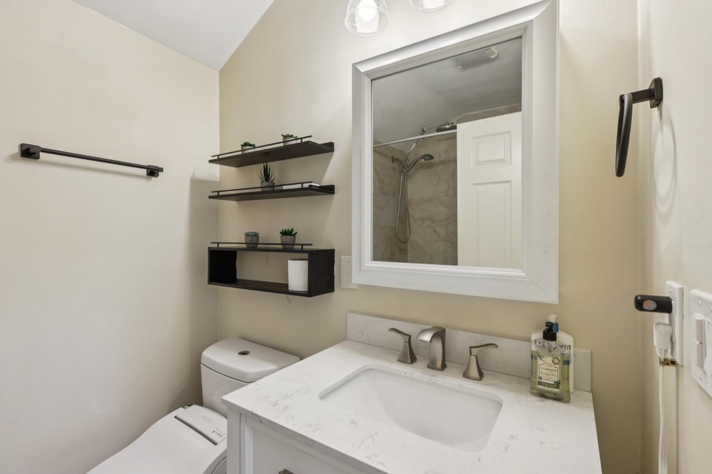 17386 Tressel Pass Road Boulder Creek, CA 95006 - Photo 22 of 41 a bathroom with a sink toilet and shower