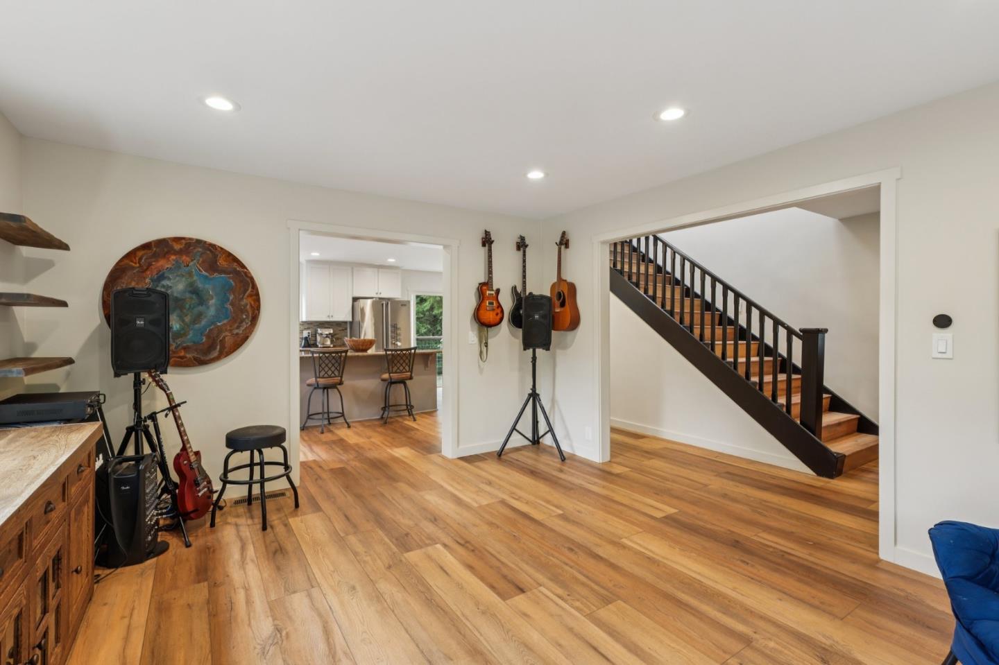 17386 Tressel Pass Road Boulder Creek, CA 95006 - Photo 5 of 41 a view of a room with wooden floor and stairs